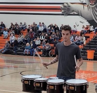 Picture of Coda Gahris playing the drums